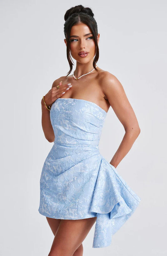 Model wearing the Elodie Mini Dress.