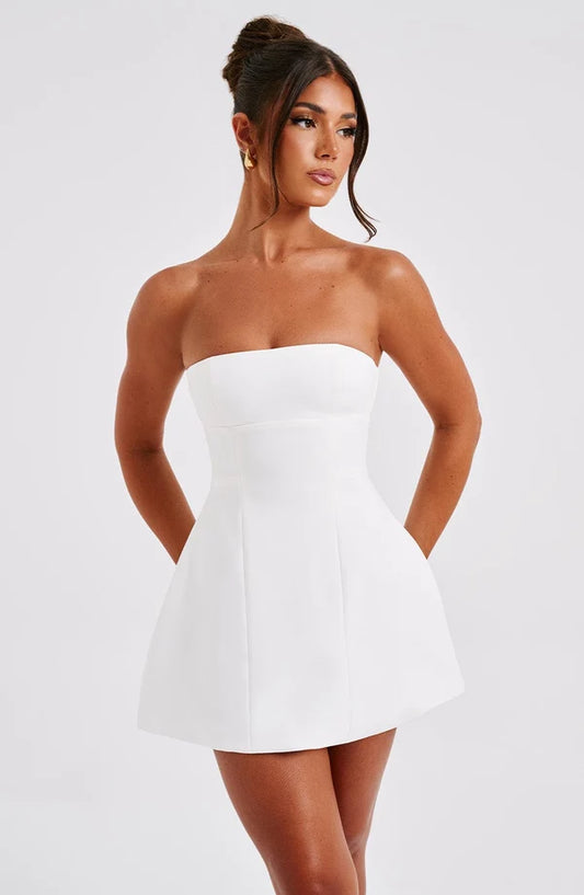 Alana Mini Dress in black featuring a high neckline, structured bubble hem, and premium crepe fabric.