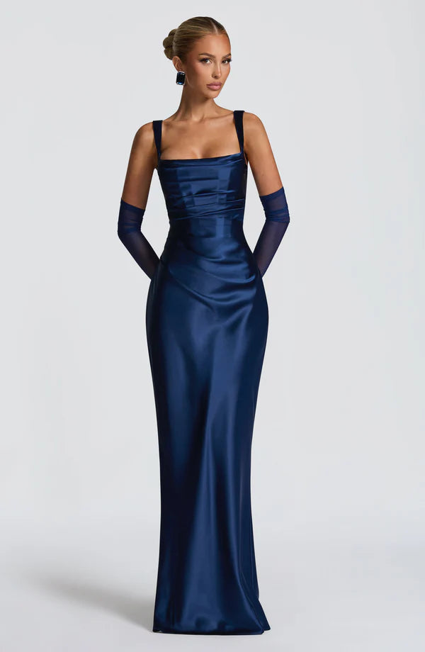 Revalline Calanthe Maxi Dress for women featuring a luxurious satin finish, square neckline, pleated bodice, adjustable straps, lace-up back, and elegant maxi silhouette for weddings, evening parties, formal events, and special occasions.