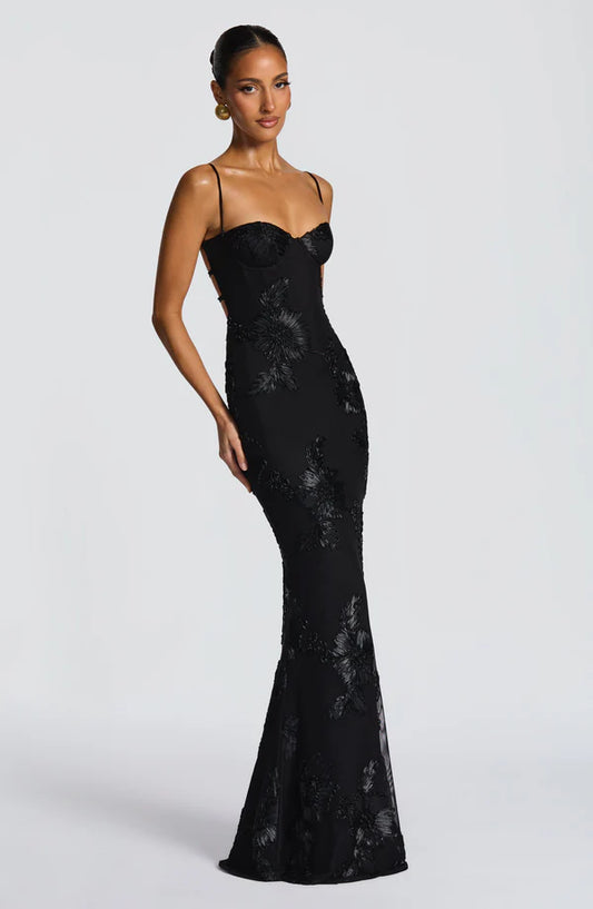 Black lace evening gown on a white background