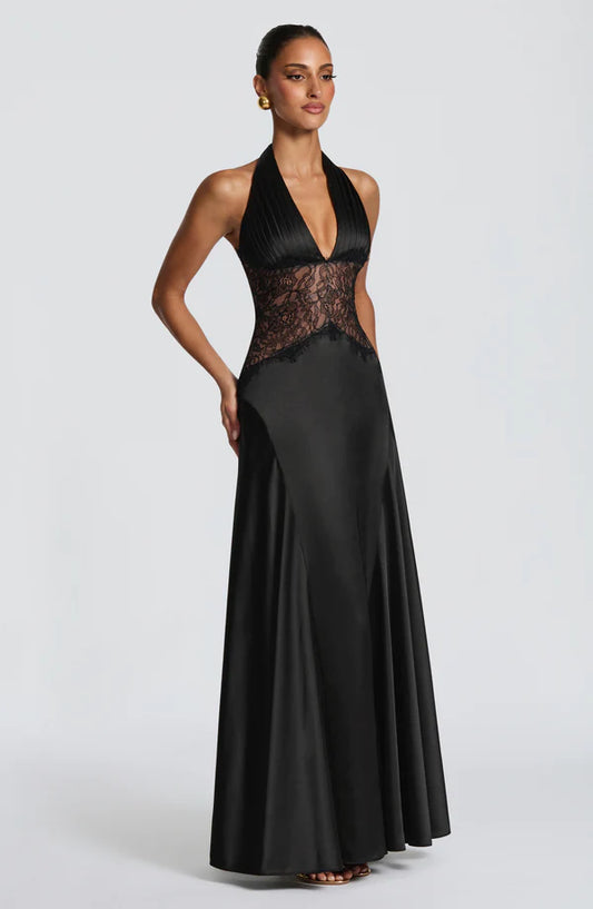 Side profile of the Virella Maxi Dress showcasing its elegant fit and flowing design for wedding guests, cocktail parties, and celebrations