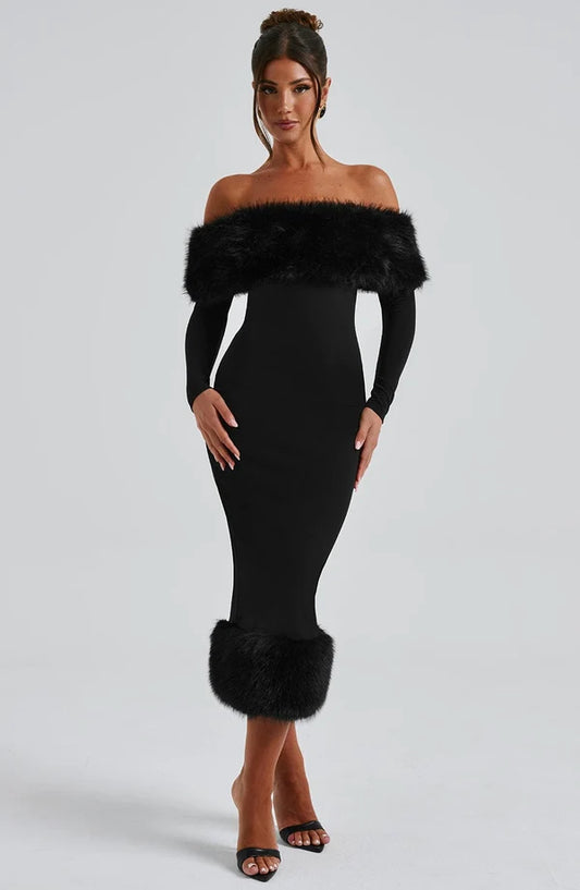 Vittoria Midi Dress by Revalline featuring a strapless neckline, long sleeves, and fitted midi silhouette for evening wear