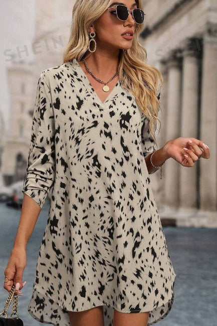 Revalline women's high low tunic dress featuring roll up sleeves, a comfortable silhouette, and a fashionable design for casual and smart occasions